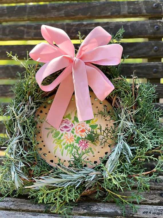 Spring wreath of juniper & lavender with a painted floral centerpiece